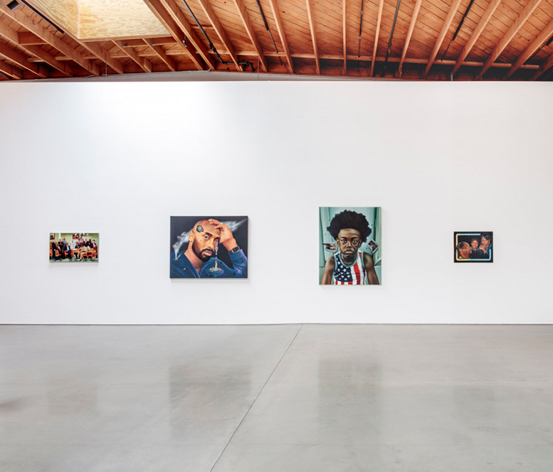 An installation image of four paintings by Mr. Wash, on view at Deitch Projects.